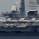 J-15 fighters parked on Liaoning’s flight deck. Four have been lost to accidents.